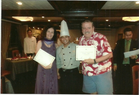 Receiving cooking certificates.